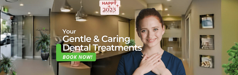 text: your gentle & caring dental treatments - book now!. Image: friendly nurse smiling at you at dental surgery reception in Glebe-Sydney-NSW.