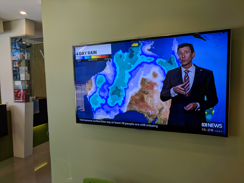 dentists glebe 12 patients waiting area with cable TV big scree n- Sydney Dental Clinic virtual tour