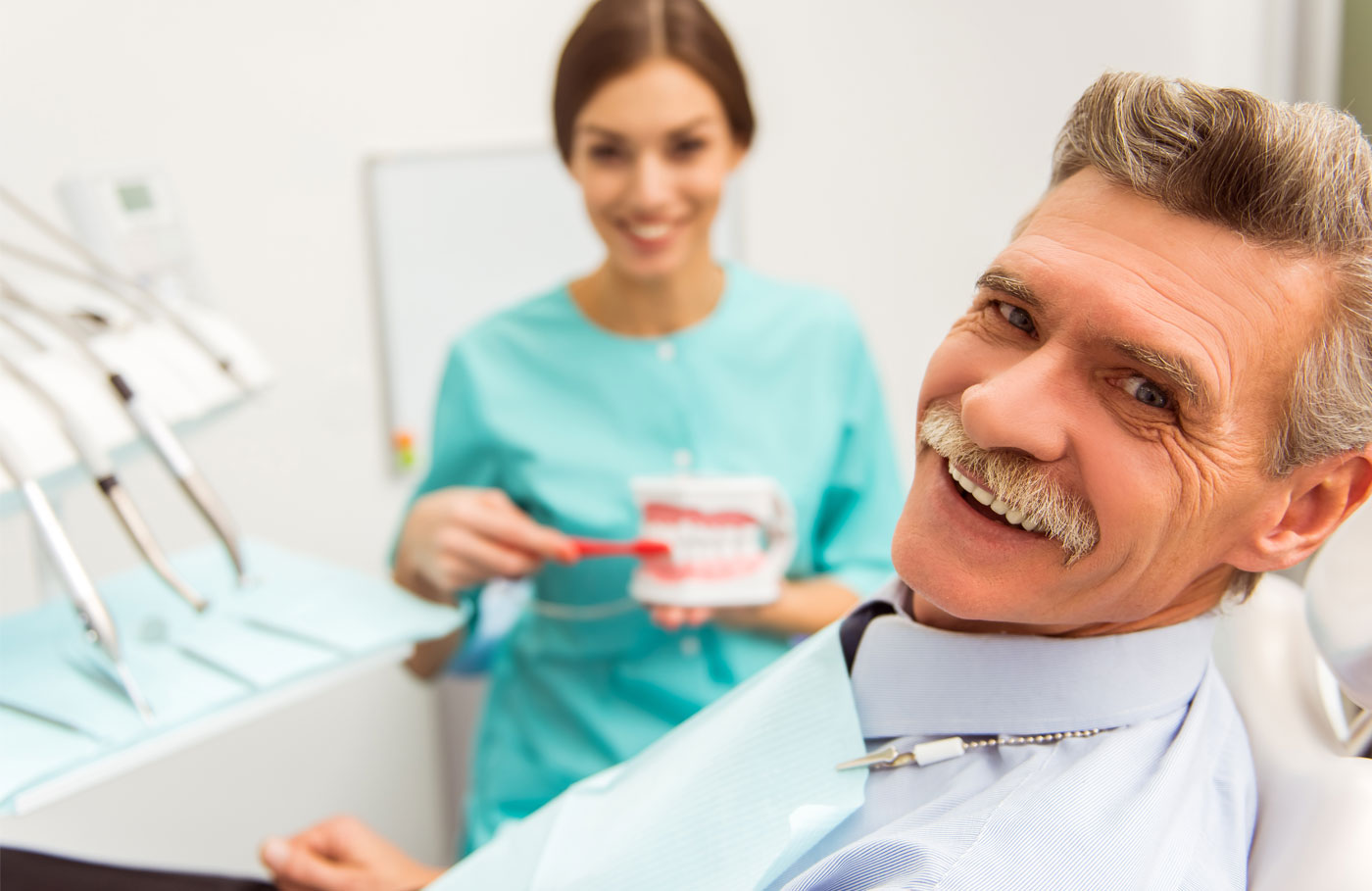 patient smiling after having tooth composite filling