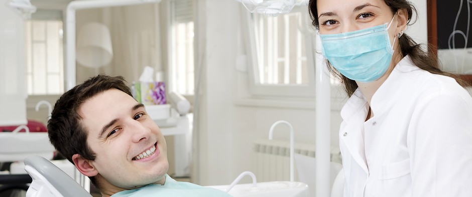 Patient smiling at dentist office in Sydney at Dental Care Glebe Sydney Dentists