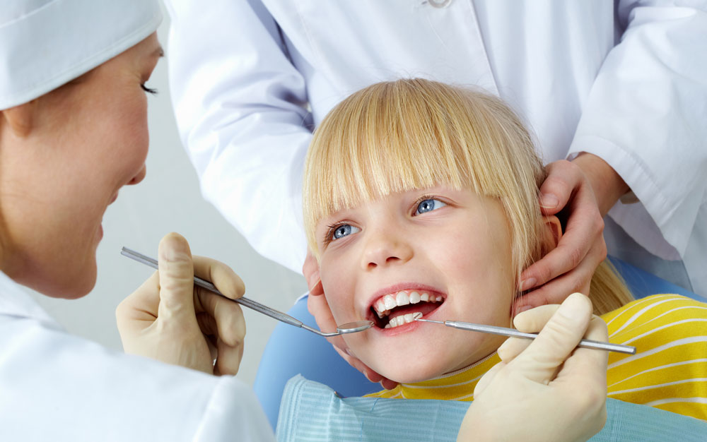 Young boy at the best Paediatric dentists nearby Sydney CBD having teeth and gums check-up in Glebe, Sydney-NSW-Australia